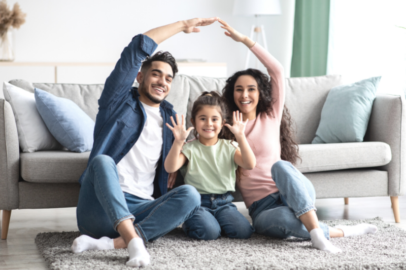 Family together seating on a floor